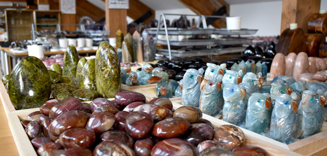 View across crystals and minerals in showroom.